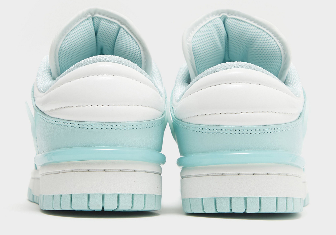 Nike The Dunk Low Flip The Old School sports a white and purple leather upper Summit White Jade Ice Dz2794 101 1