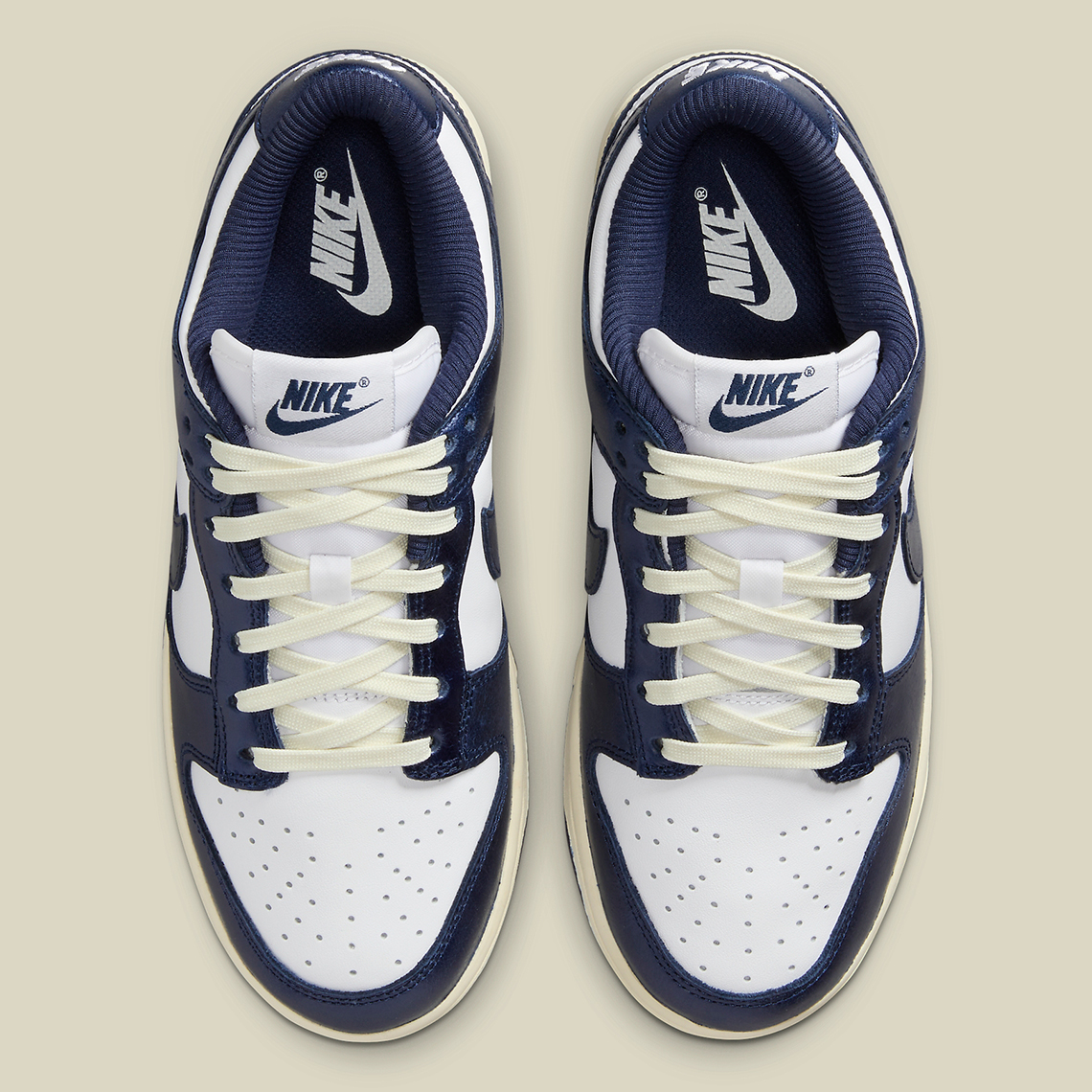 Nike Dunk Low Vintage Navy White Sail FN7197-100 | SneakerNews.com