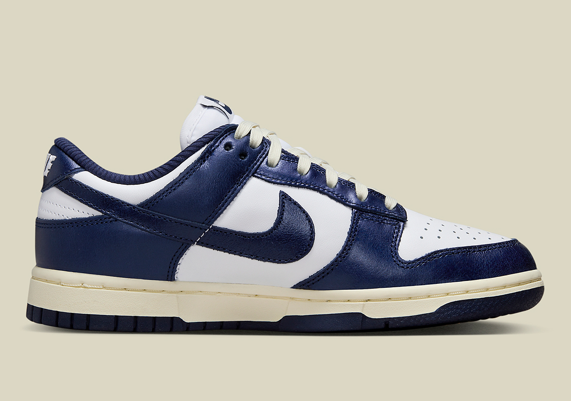 Nike Dunk Low Vintage Navy White Sail FN7197-100 | SneakerNews.com