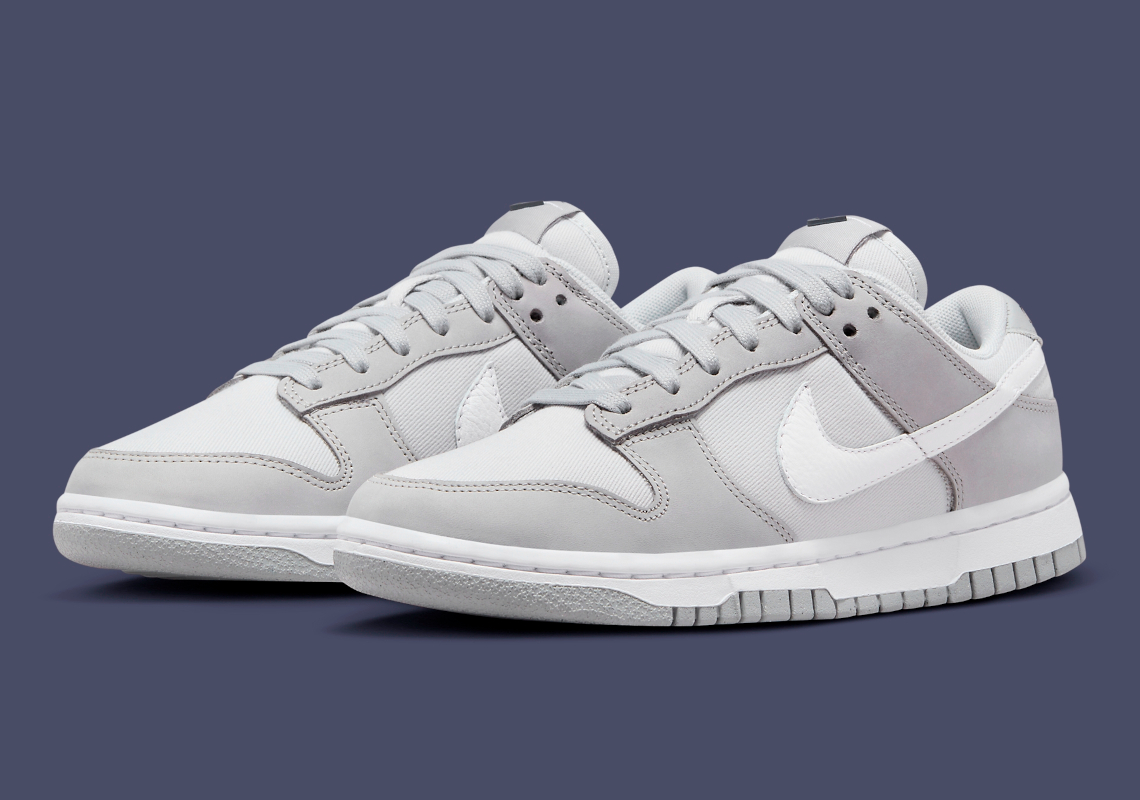 A Grayscale Finish And Cotton Twill Base Appears On This Women's Nike Dunk Low