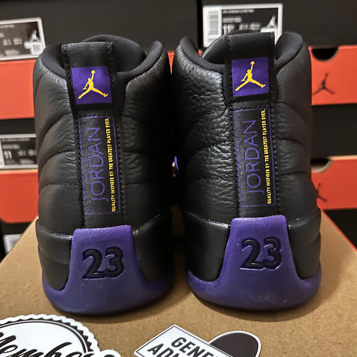 Jordan 12s on sale black and purple