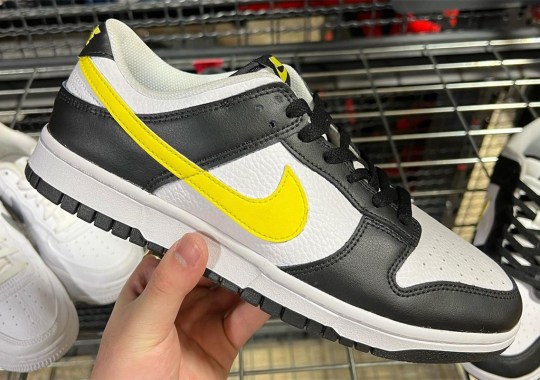 The Nike Dunk Low Appears In A "Black/Yellow" Pairing