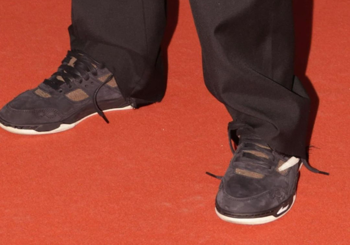 Travis Scott Debuts Possible New Nike Shoe Collaboration At 76th Cannes Film Festival