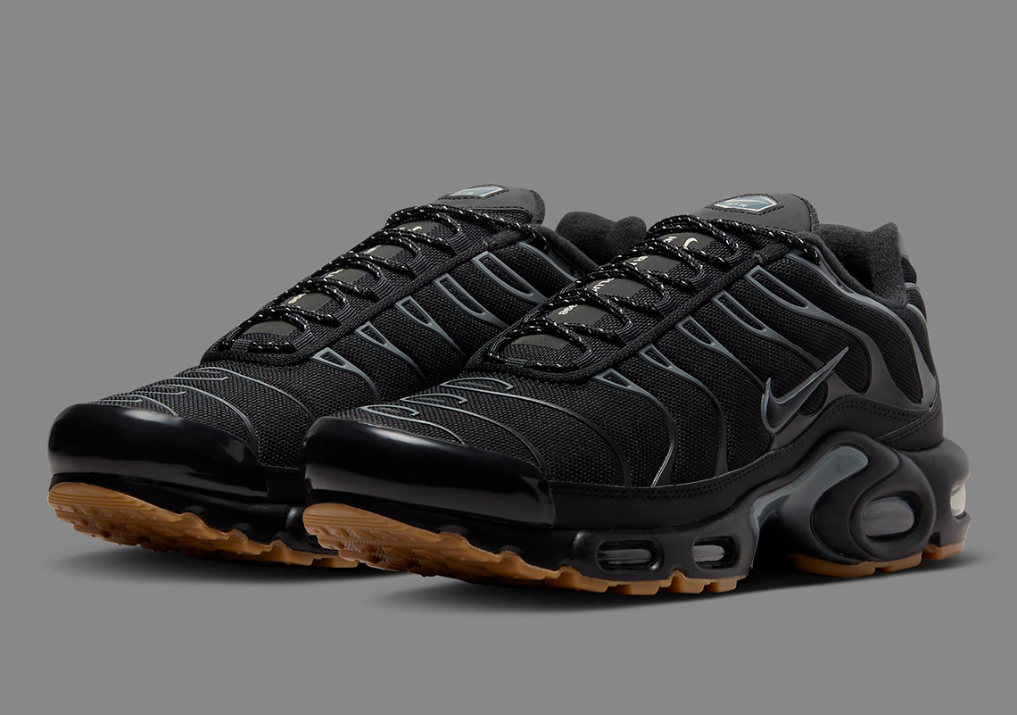 The Nike Air Max Plus Adds Gum Bottoms To This Blacked-Out Colorway