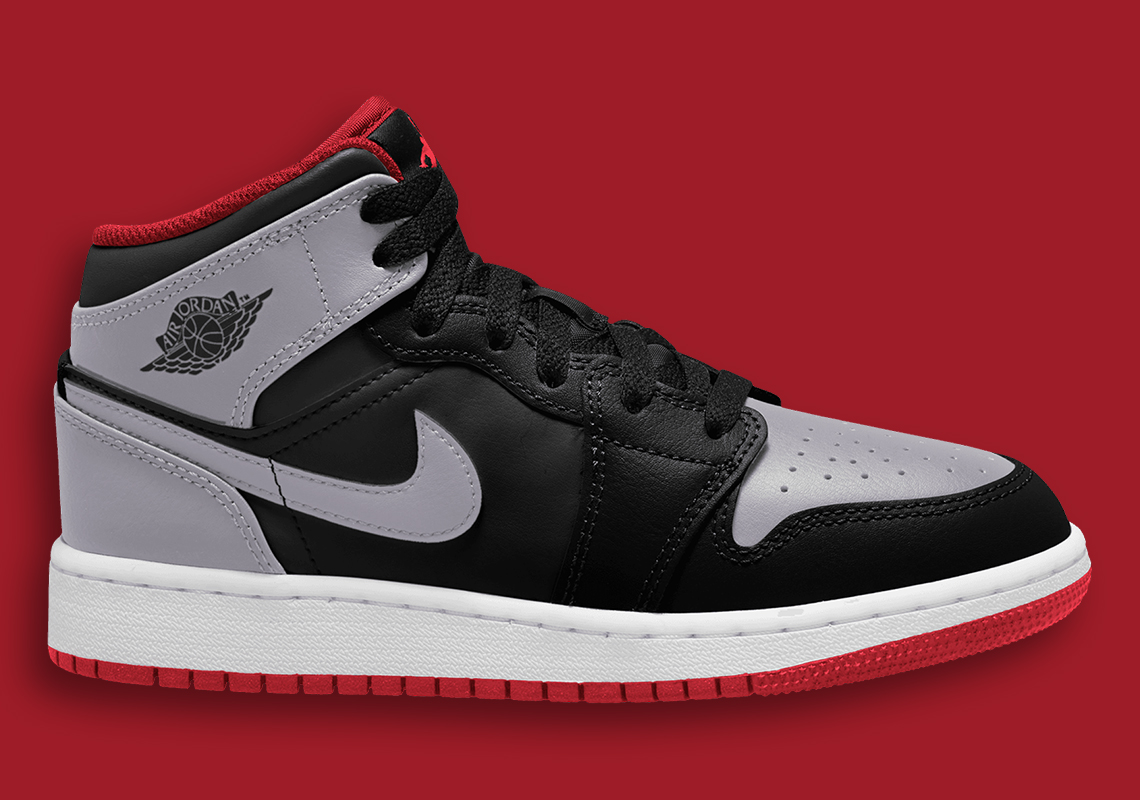 The Air Jordan 1 Mid Adds A Pop Of Red To This “Shadow” Reminiscent Colorway
