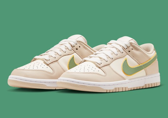 The Nike Dunk Low “Pale Ivory” Sees A Stacked Swoosh In Green