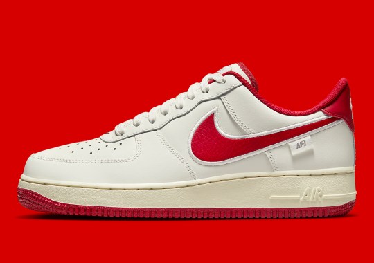 “Aged” Midsoles Land On This Red-Accented Nike Air Force 1 Low With Enlarged Swooshes