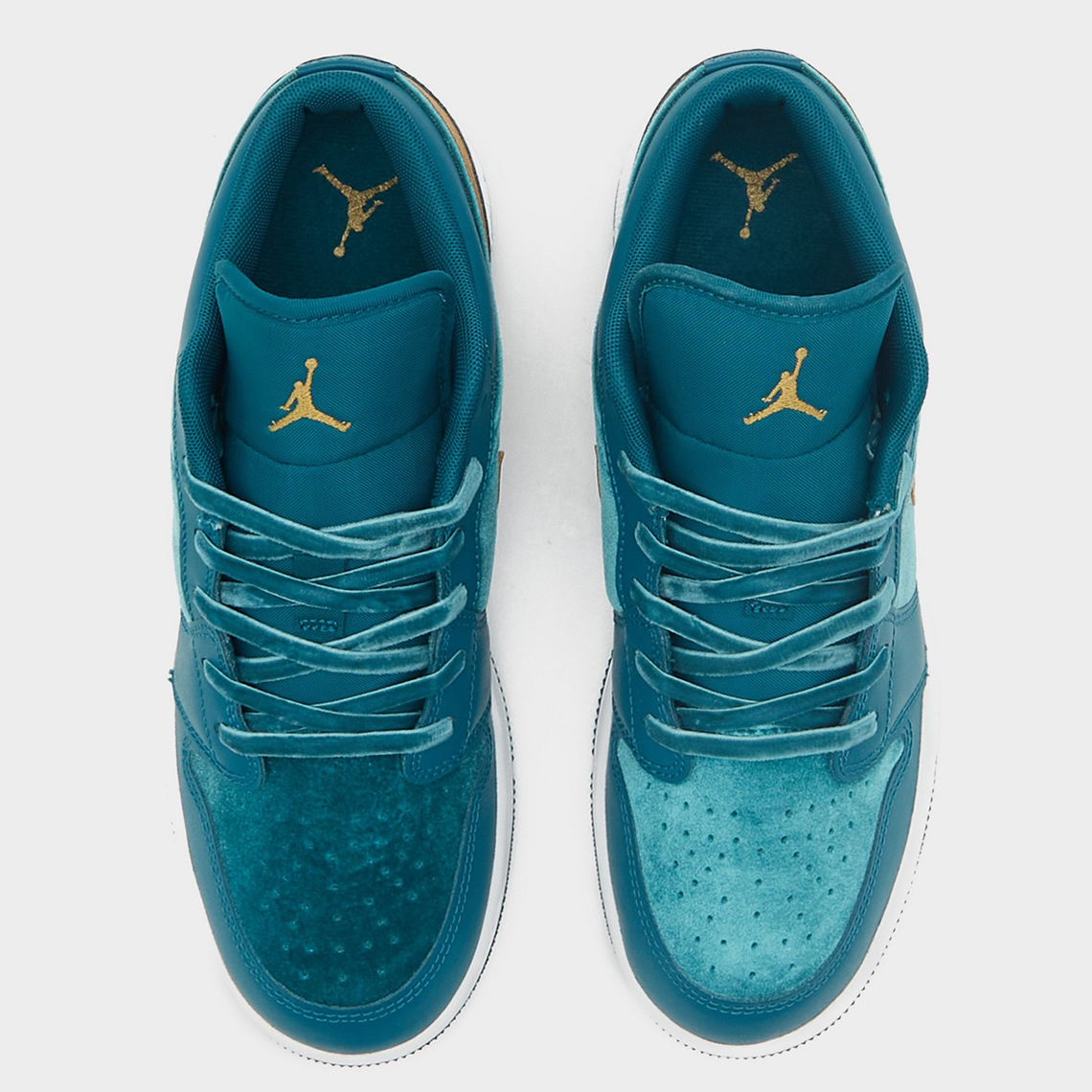 Jordan Brand quietly slipped in a new rendition of the low-top Air Low Gs Teal Velvet 1