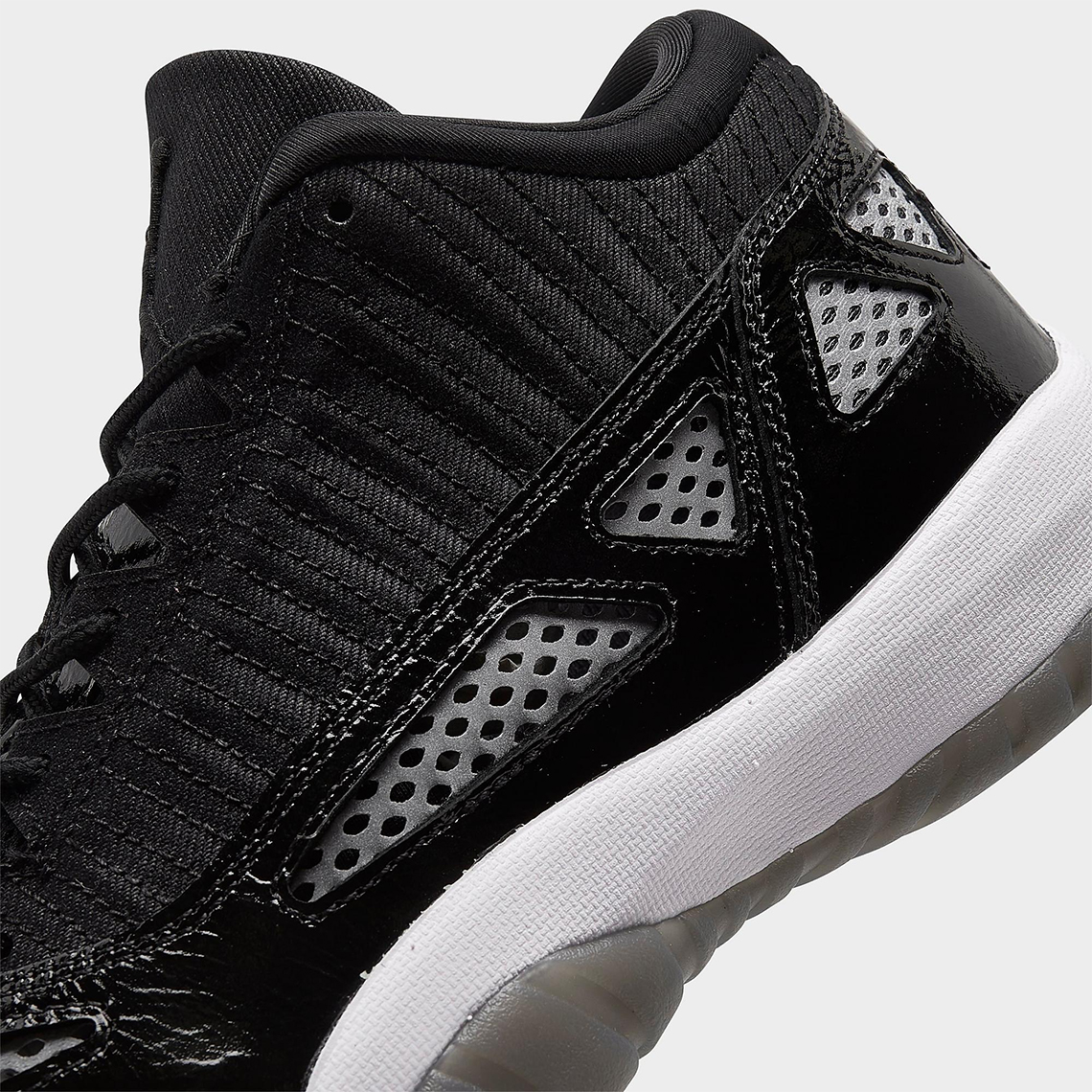 The Air Jordan 11 Low IE Black White Releases September 22