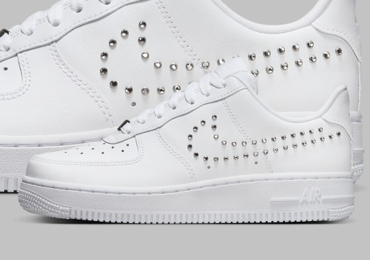 “Metallic Silver” Studs Form Swooshes On This Women’s Nike Air Force 1 Low