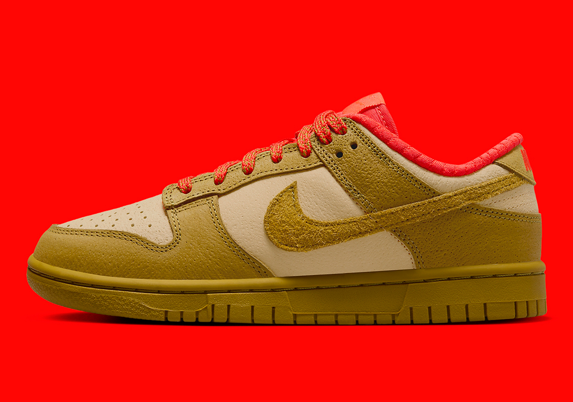 This Nike Dunk Low Pairs "Sesame" And "Bronzine" With A Dash Of "Picante Red"