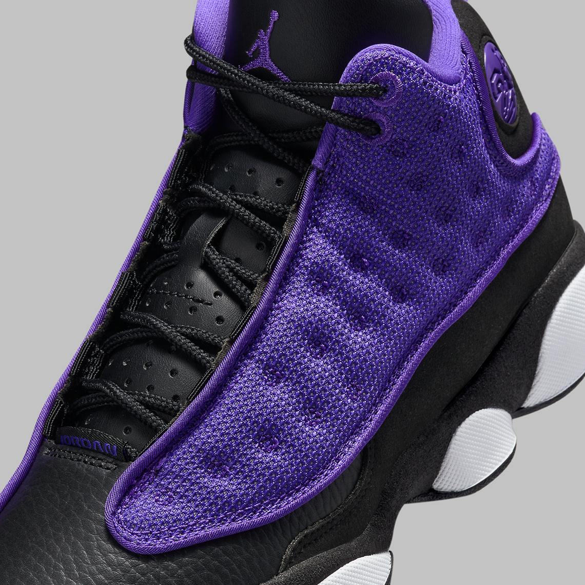 Jordan retro 13 sales black and purple