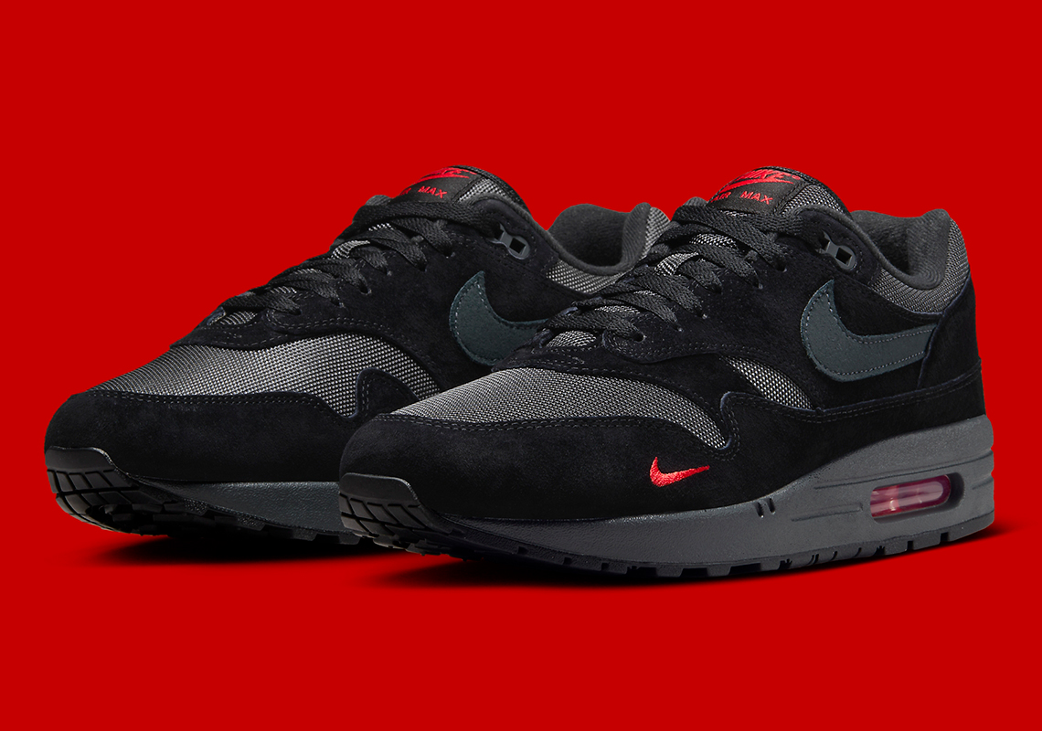 "University Red" Flair Animates This Stealthy Nike Air Max 1