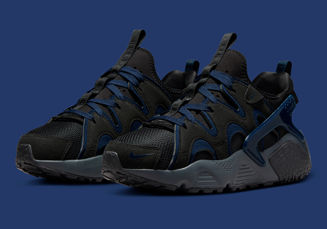 The Nike Air Huarache Craft Rests On "Obsidian" Tinted Accents