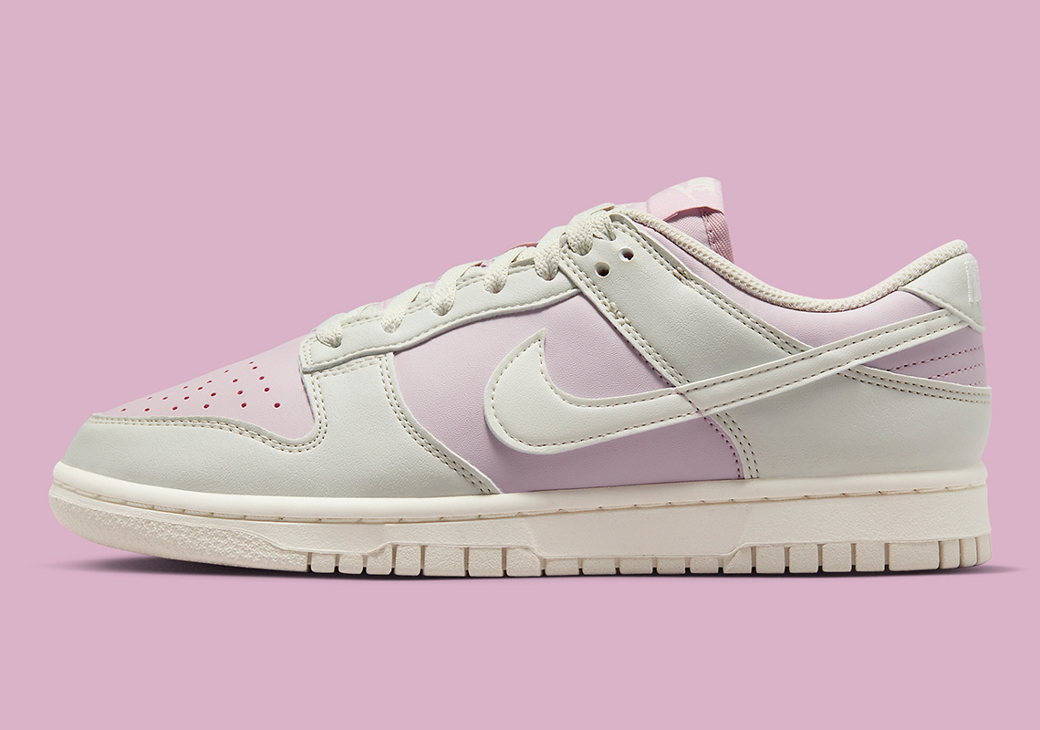 The Nike Dunk Low Next Nature Pairs Light Bone With A Touch Of Pinks