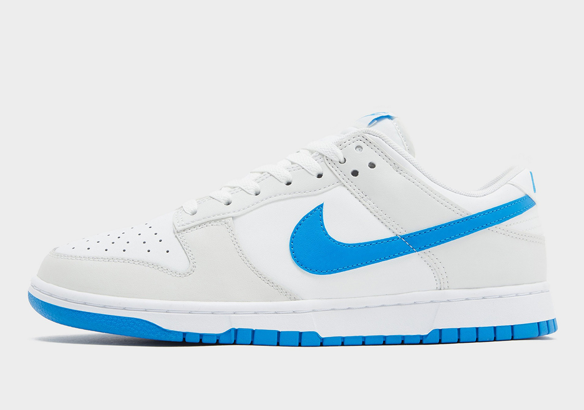 The Nike Dunk Low Surfaces With Florescent "Photo Blue" Accents