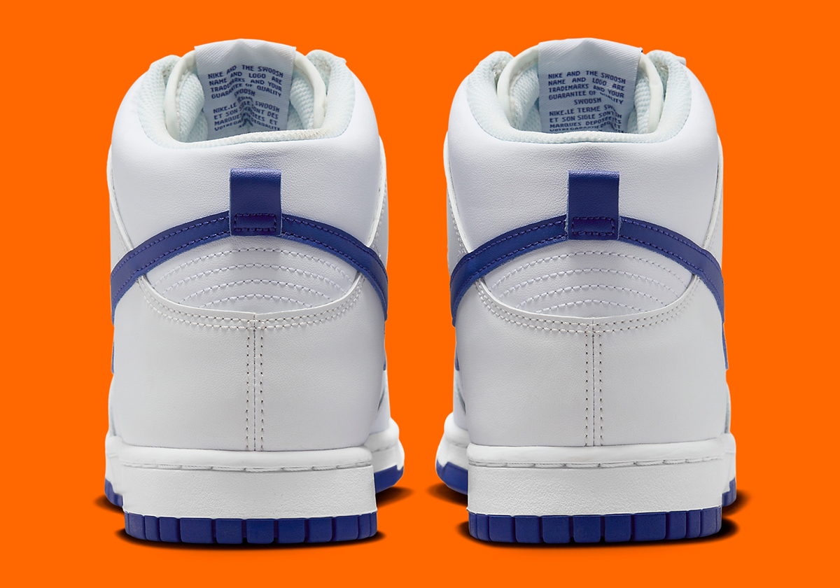 white and royal blue nike shoes