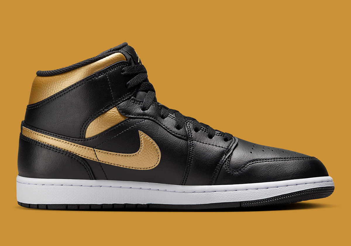 nike jordan 1 black and gold