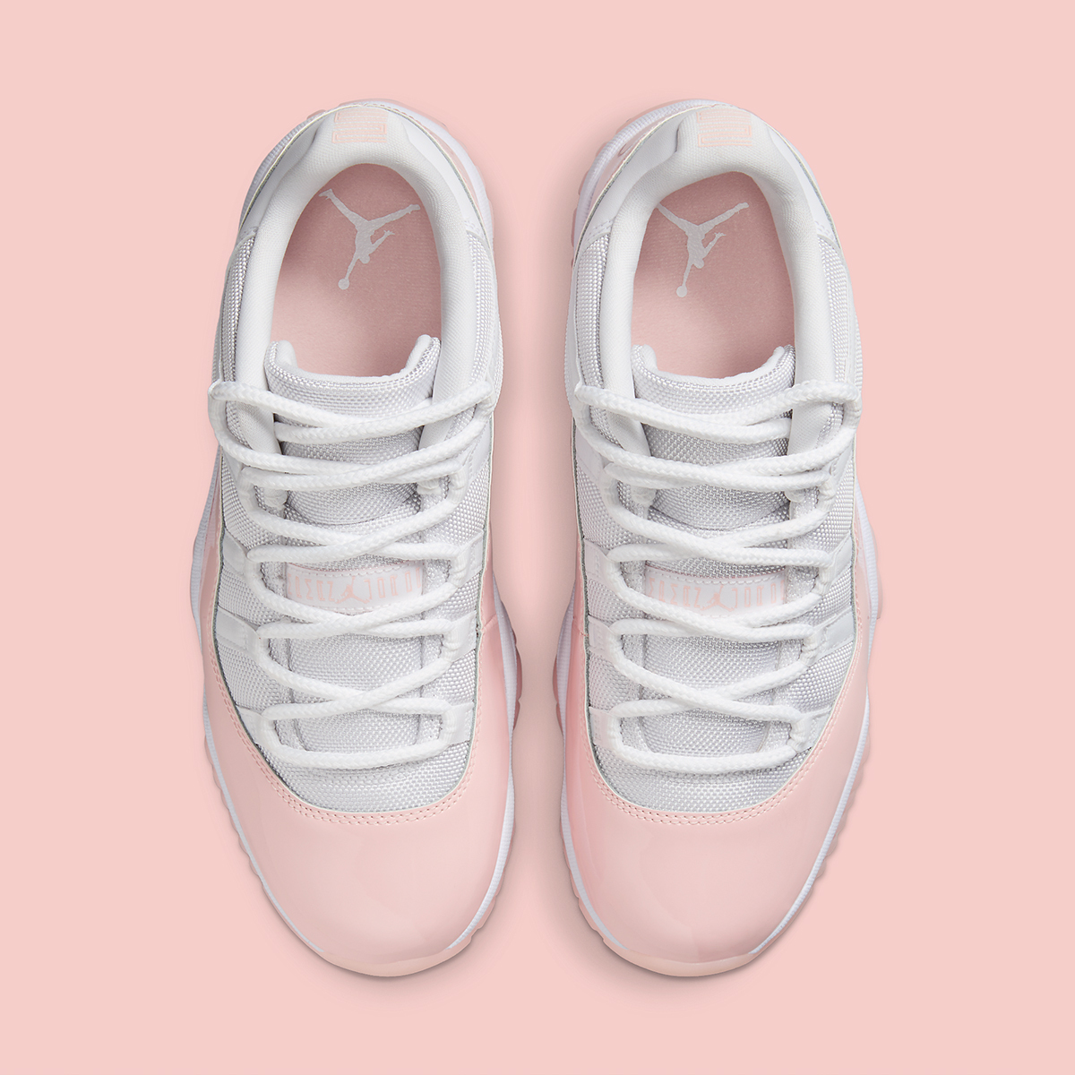 pink and white jordan 11 high top