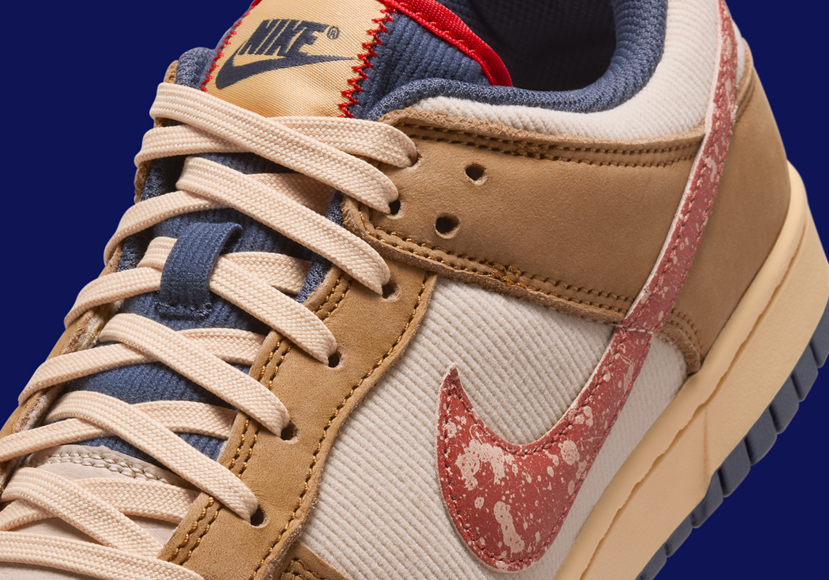 Nike Adds A Vintage Vibe To The Dunk Low With Blemished Swooshes