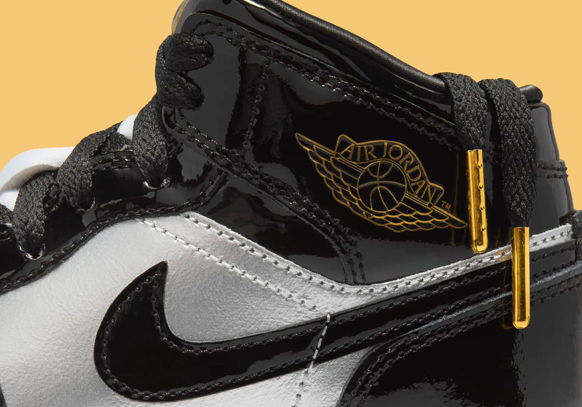 Jordan Adds "Metallic Gold" Accents To The Kid's Air Jordan 1 Mid