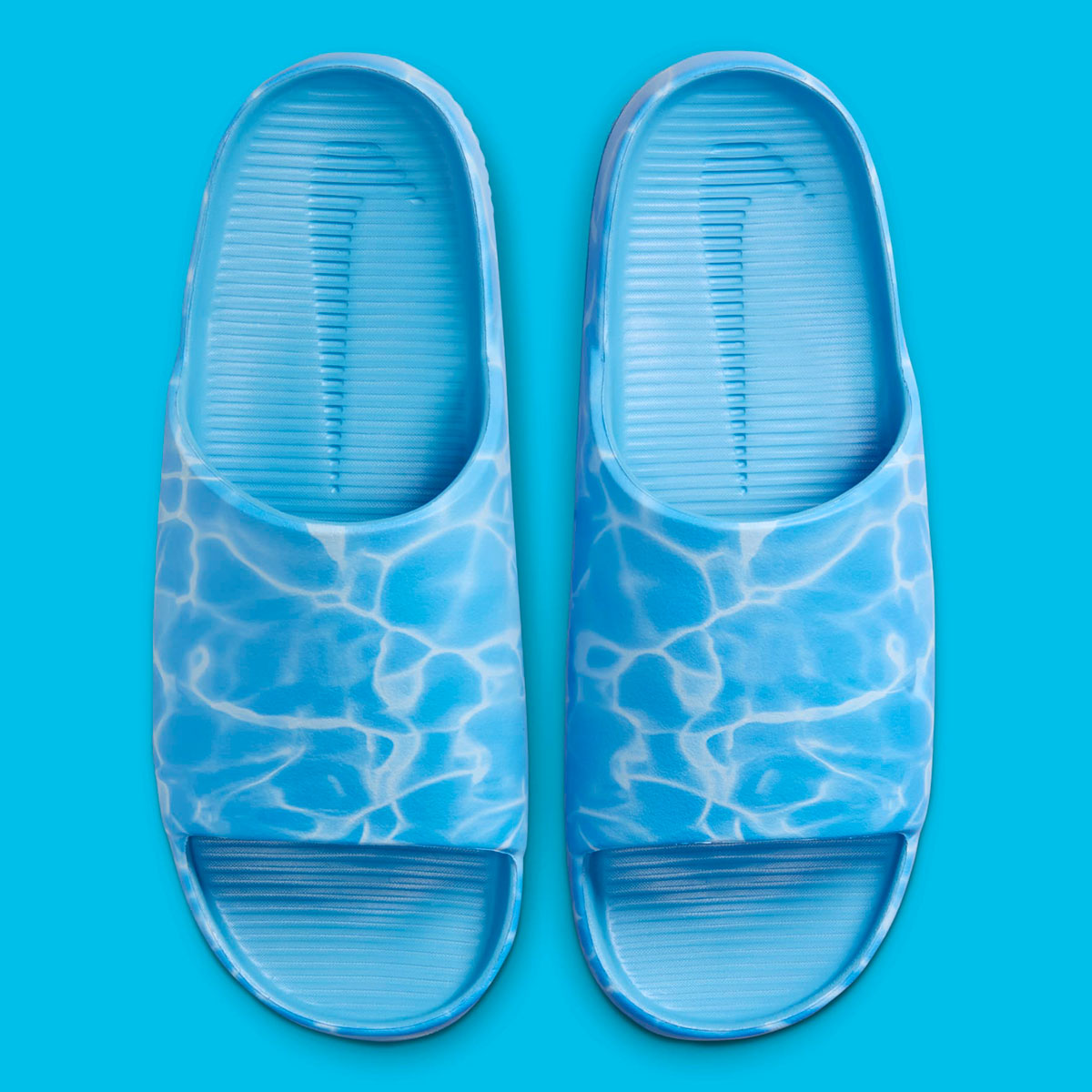 nike calm slide water hq1125 400 1