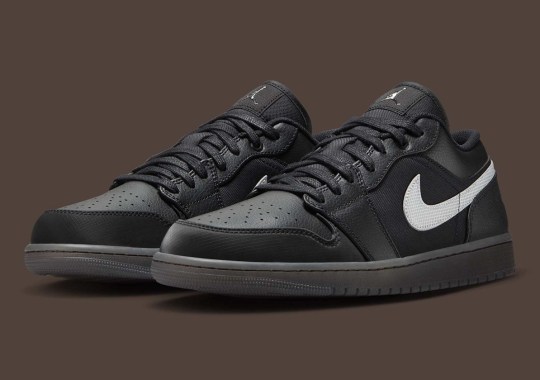 Dark Gum Soles And Reflective Swooshes Appear On The Air Jordan 1 Low