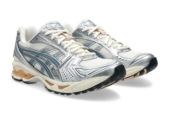 The ASICS GEL-Kayano 14 Cops Silver And Gold Accents