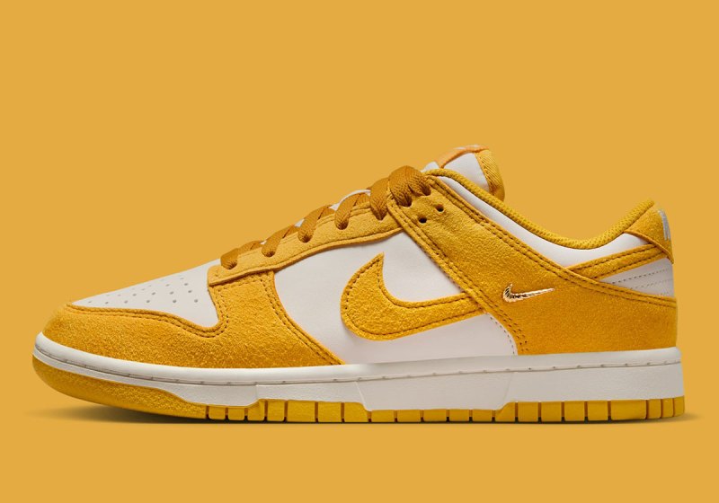 Dunks Mini Nike Dunk Low Gold Mini Swoosh IB4417-100 | SneakerNews.com