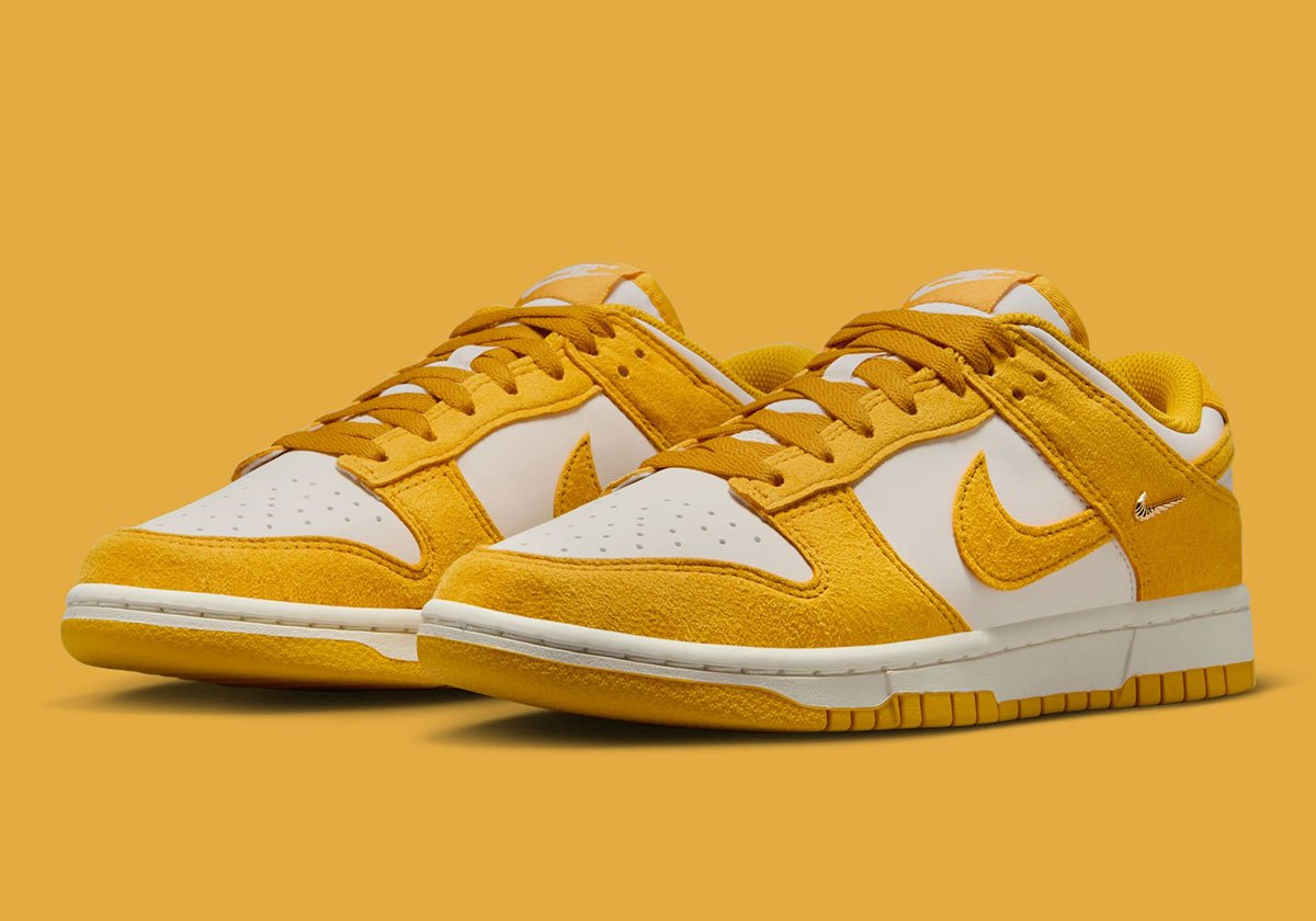 Dunks Mini Nike Dunk Low Gold Mini Swoosh IB4417-100 | SneakerNews.com