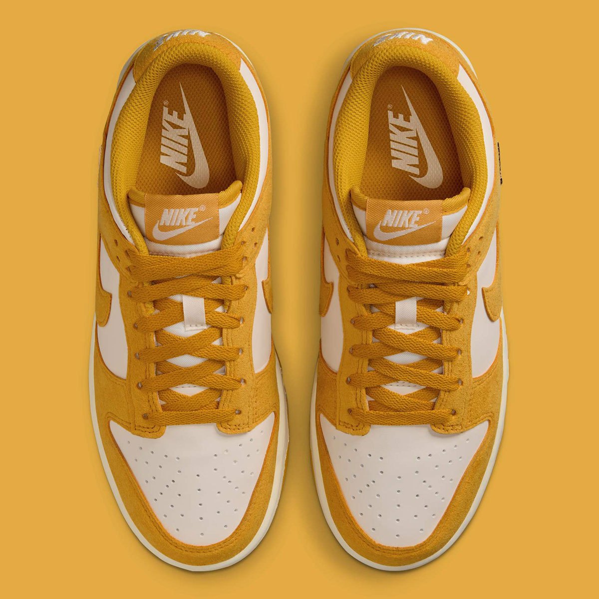 Dunks Mini Nike Dunk Low Gold Mini Swoosh IB4417-100 | SneakerNews.com