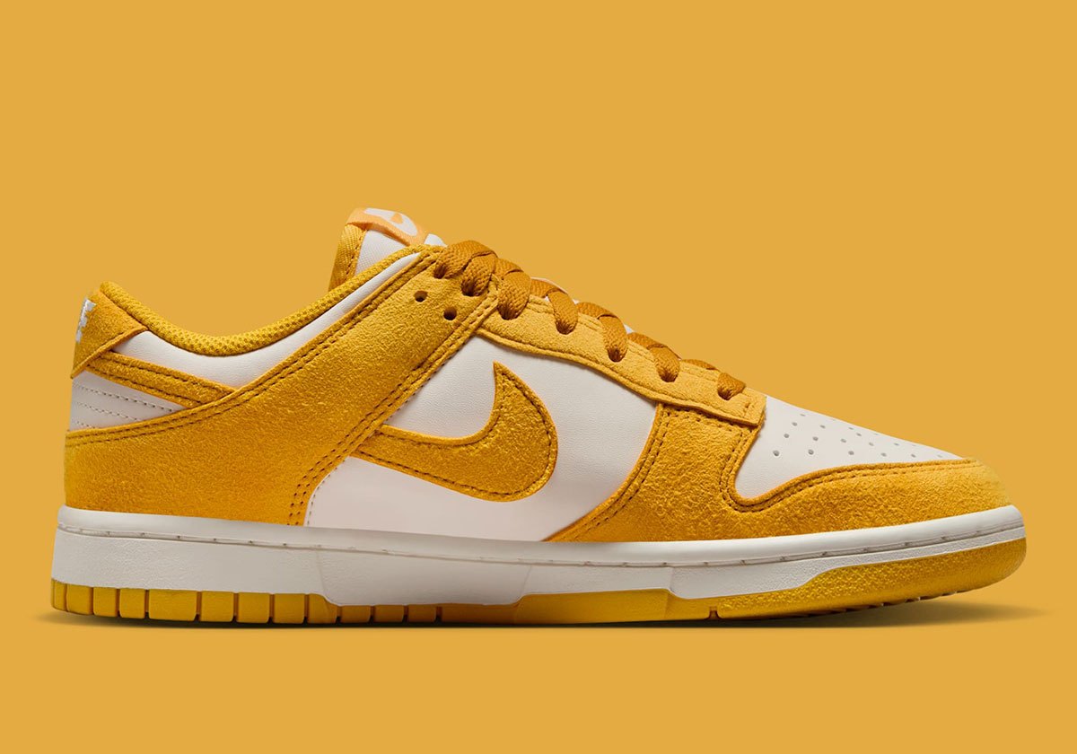 Dunks Mini Nike Dunk Low Gold Mini Swoosh IB4417-100 | SneakerNews.com