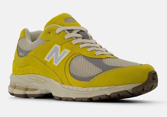 Yellow Suede Wraps The New Balance 2002R