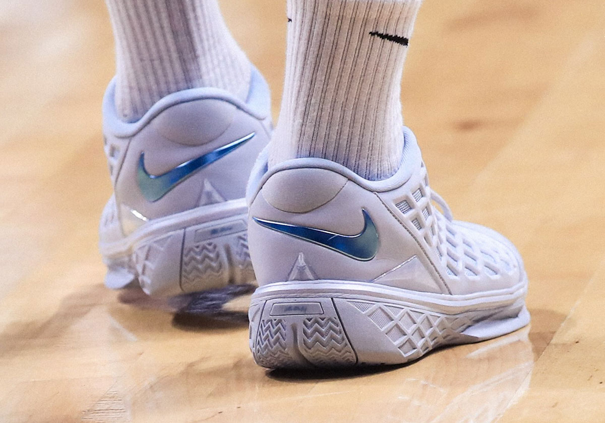 The Nike Kobe 3 Low Protro Polishes "Pure Platinum"